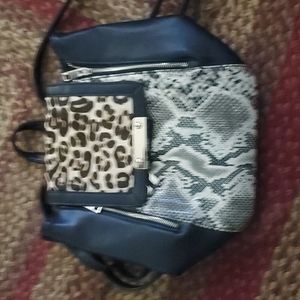 Lola Accessories Snake Skin and Leopard Backpack. Carried for about a week